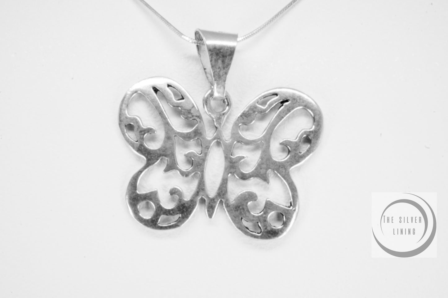 Dije de plata 925, Mariposa calada garigoleada