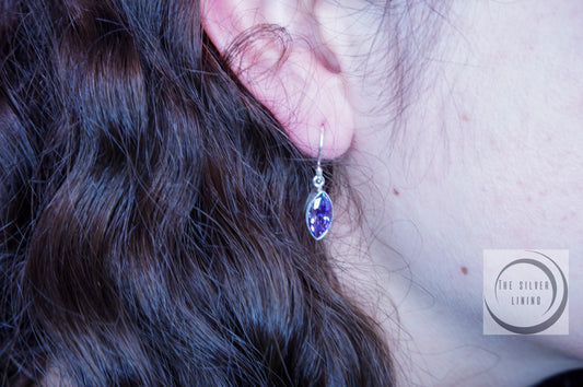 Juego de dije y aretes de plata solida 925, metamorfosis con circonia morado con cadena incluida